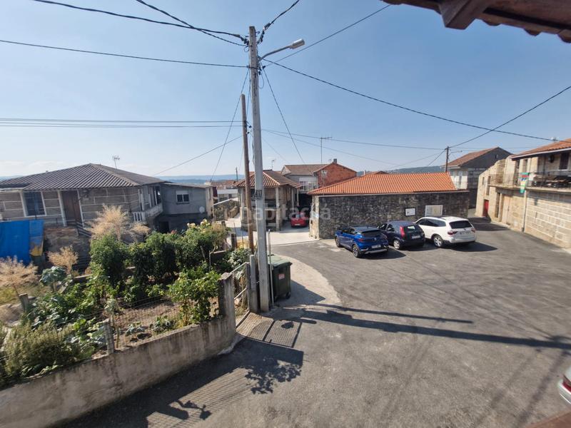 Foto c20fae83-aec3-4827-a033-7eadbb6e332a. Casa adosada casa muy prox poligono en San Cibrao das Viñas