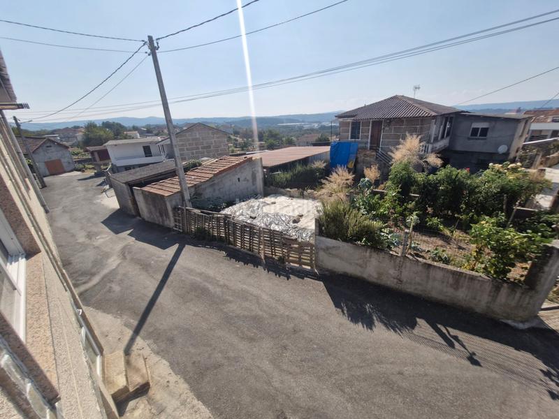 Foto eaed81cf-5834-4b3a-936b-91677a9a86d3. Casa adosada casa muy prox poligono en San Cibrao das Viñas