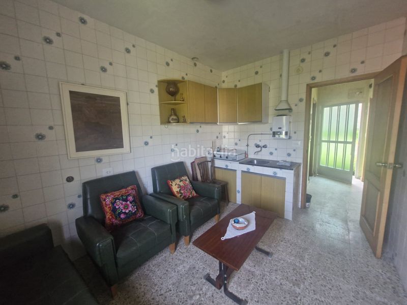 Foto a5d58e4b-83c3-43be-afdf-1ce4e042f1e0. Casa adossada a Maceda