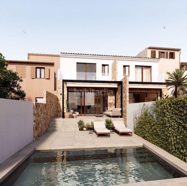 Foto efa31aec-58a4-4c57-a400-e84ffe86454d. Casa adossada amb aparcament a Maria de la Salut