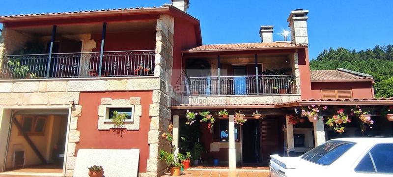 Foto 65fa537d-22f9-421a-8f35-db175949e38d. Chalet con riscaldamento parcheggio in Moaña