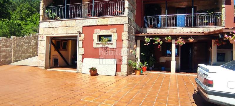 Foto 1f64d5c7-a099-4727-b597-11bb432c3d4b. Xalet amb calefacció aparcament a Moaña