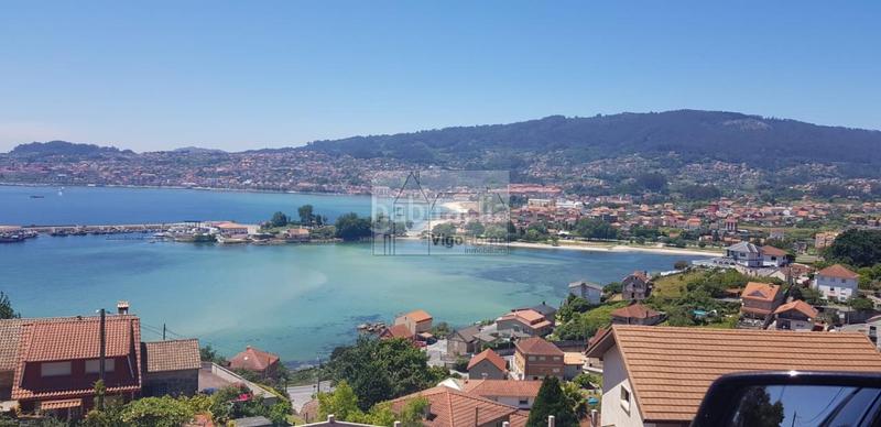 Foto 1697ec08-c9f4-4691-899c-2c7f97b2c500. Casa amb calefacció aparcament a Moaña