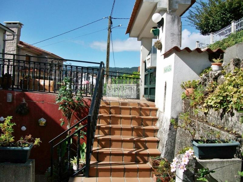 Foto 7f8f7bea-1dcf-4cba-b7fb-43c299c26e6c. Casa amb calefacció aparcament a Moaña