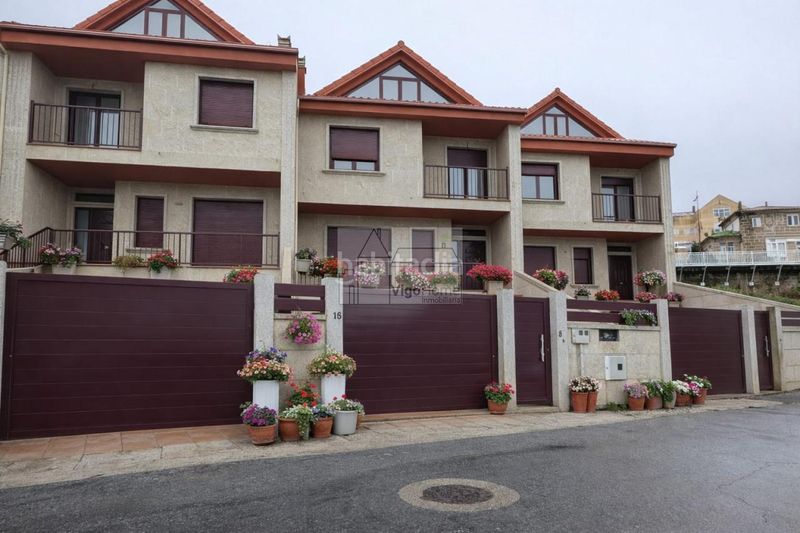 Foto d667324a-9b6e-49fe-9143-206cff0e385f. Casa adossada amb calefacció aparcament a Teis Vigo