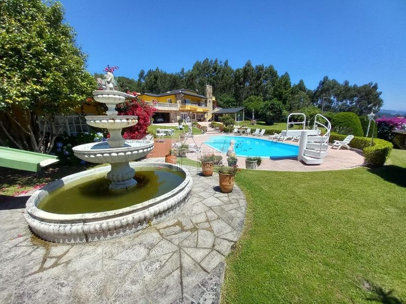 Foto 1a124bce-684d-4cd1-90bd-7c1dc3c079b1. Chalet en Darbo Cangas