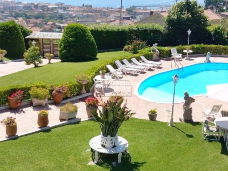 Foto 2940cad6-8ba1-417c-bc17-e7141d2b668f. Chalet en Darbo Cangas