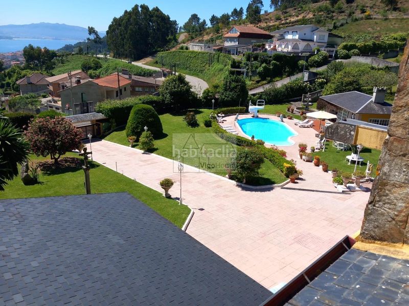 Foto 412e85bf-7686-4c21-95d5-573ece4ea5ee. Chalet en Darbo Cangas