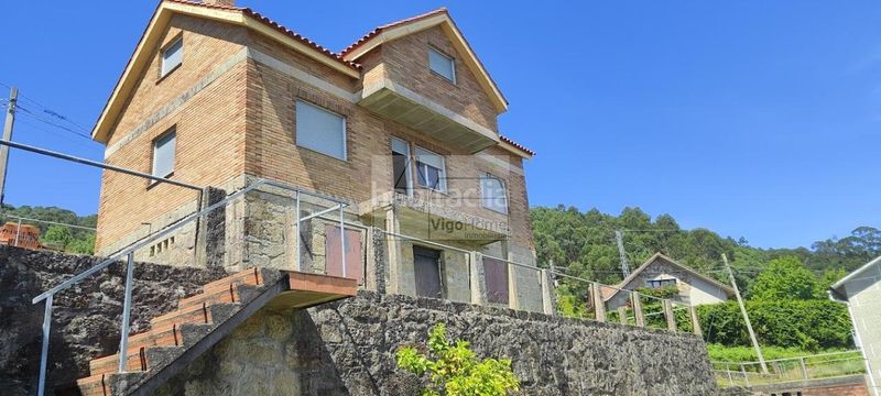 Foto 72409889-ac54-4fa7-bf04-4fb70453e4e0. Casa amb aparcament a Moaña