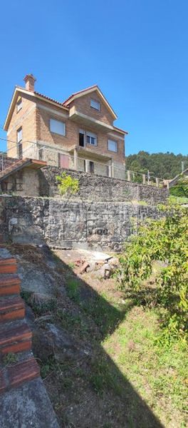 Foto 7fc3e4ad-07a9-4e3c-83e5-bb00bc121c8b. Casa amb aparcament a Moaña