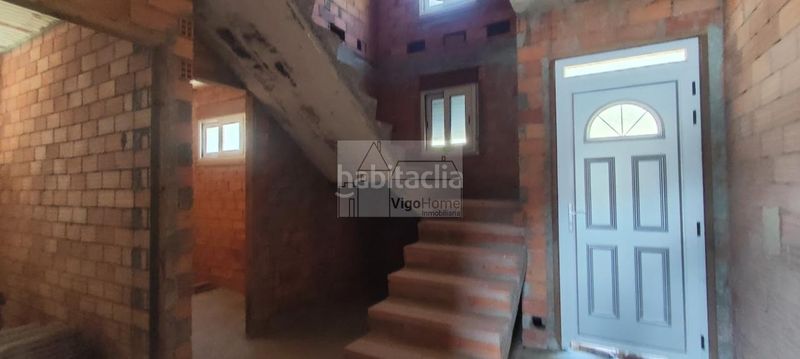 Foto ccc34e73-eddf-400e-a80d-8a19180f7d86. Casa amb aparcament a Moaña