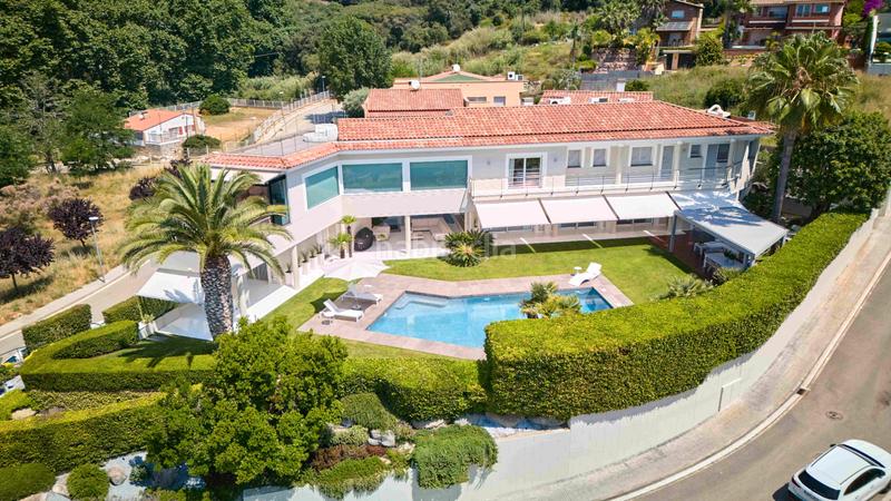 Foto bb0d0eb8-a69d-42e8-8769-c8d7326e0594. Haus mit kamin heizung parking pool in Urbanitzacions Sant Pol de Mar