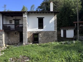 Casa adossada a Posada-Barro. Casa adosada