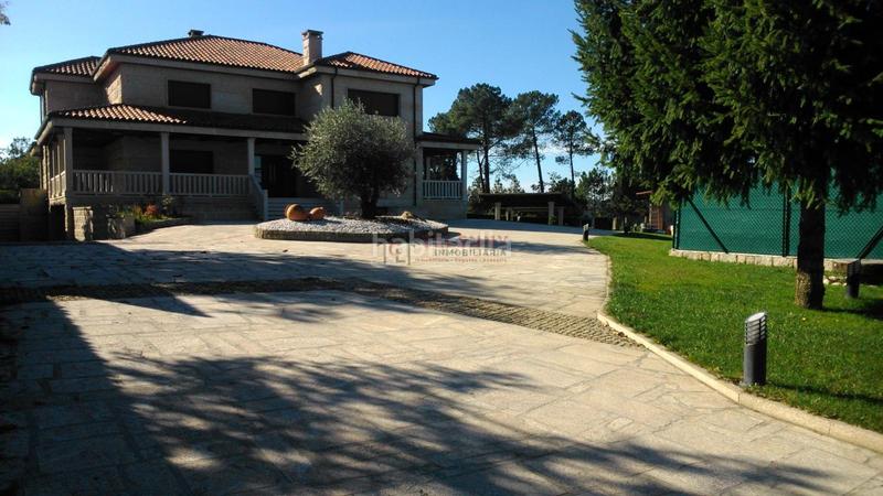 Foto 1caf41db-8350-4e87-8278-0329831a6dac. Chalet con riscaldamento parcheggio piscina in San Cibrao das Viñas
