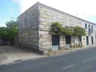 Casa adossada a Merca (A)