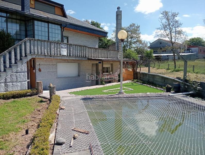 Foto 3ffb220f-b65b-4f35-b265-ab9616f383e5. Chalet con riscaldamento parcheggio piscina in San Cibrao das Viñas