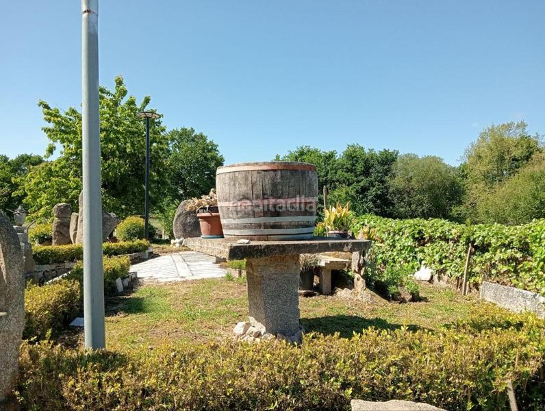 Foto 9bd197ee-556b-44a9-9474-8c65af86b5cd. Chalet con riscaldamento parcheggio piscina in San Cibrao das Viñas