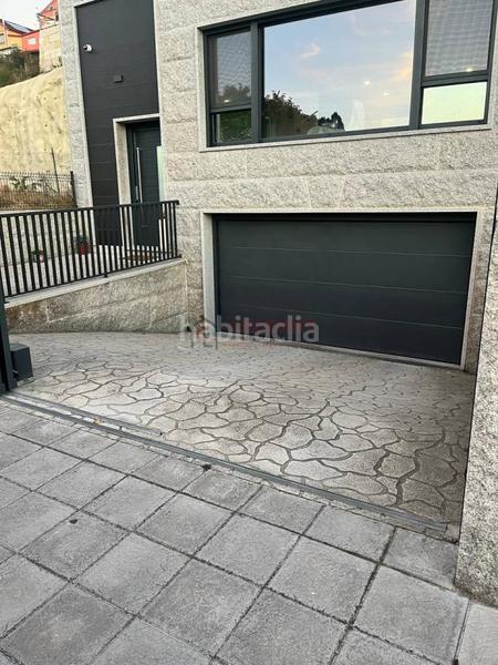 Foto 00ada0cf-a012-47d4-b423-c40b7cad3a79. Casa a schiera con riscaldamento parcheggio in Barrocanes Ourense