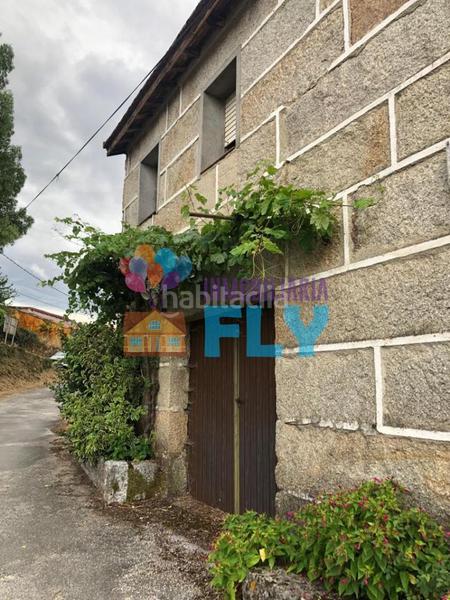 Foto b671184c-e968-4fd0-aee2-2d2b91c392ed. Haus mit parking in Taboadela