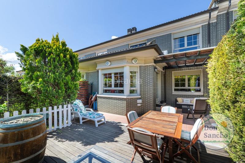 Foto f0b52cd0-020b-4577-8749-47156950f59e. Casa a schiera con riscaldamento parcheggio piscina in Valladolid