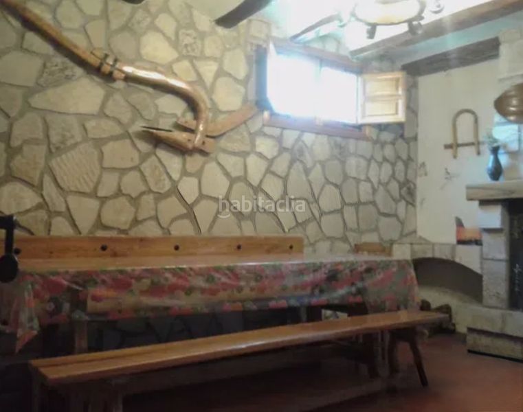 Foto a2aaeff9-ebdb-4ab8-a343-df94ed0bcf1f. Country house with fireplace heating in Vileña
