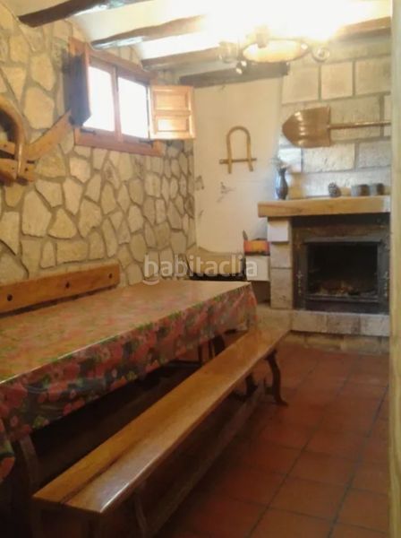 Foto b19ad2f4-4b19-49cf-b3e2-f727ace6940b. Country house with fireplace heating in Vileña