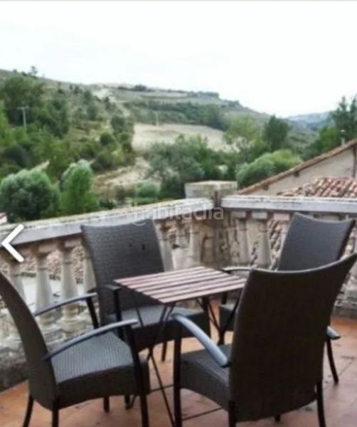 Foto b45f636e-1707-4588-b739-53b2e1c5cc44. Country house with fireplace heating in Vileña