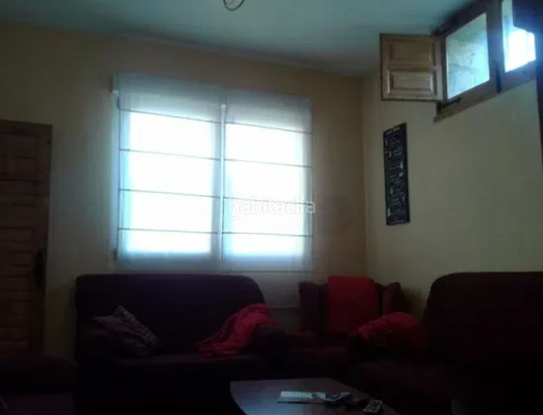 Foto e9f9c70d-2a7e-4b8c-a76d-2483d063dc91. Country house with fireplace heating in Vileña