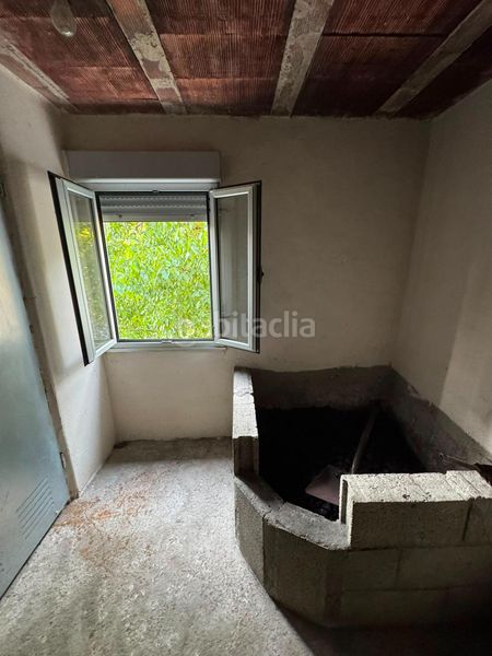 Foto c2537a5b-3e59-48cd-bc0a-ece79142b4a0. Casa amb aparcament a San Martín del Rey Aurelio
