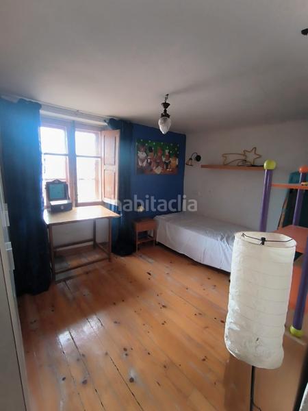 Foto e59e8741-54b9-4886-bda5-5cc0a836a07a. House with fireplace heating in Revillarruz