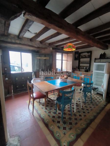 Foto fd70d0bd-90be-4f02-842c-0a41229173d2. House with fireplace heating in Revillarruz