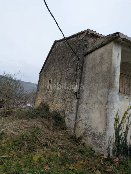 Foto 33a4e702-fecc-44a2-b2ea-c60ffc5d7379. Casa aparellada a Ruesga