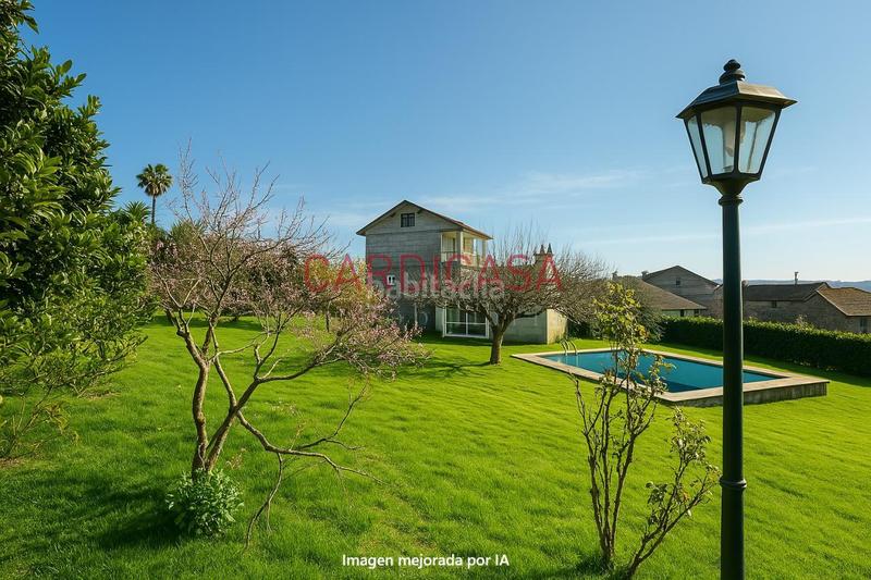 Foto 0a89356b-d56b-4398-a9ee-9cdc7f00c64e. Casa amb calefacció aparcament piscina a Vilaboa