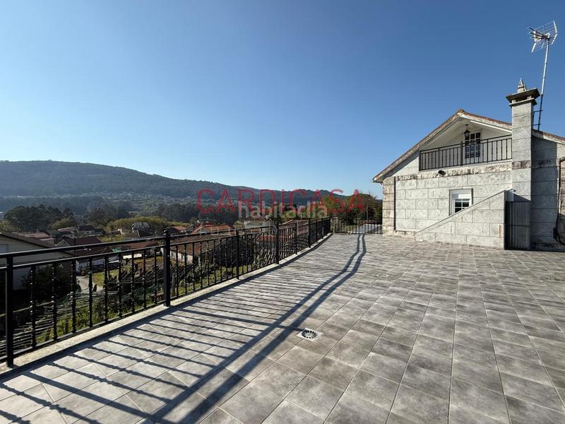 Foto 3c473c74-2668-4dcc-94c9-f83502db274c. Casa amb calefacció aparcament piscina a Vilaboa