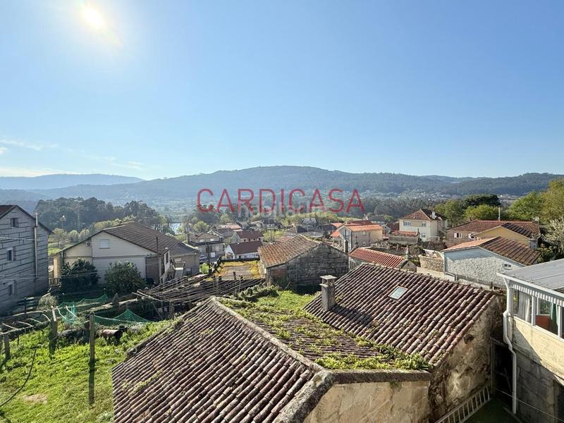 Foto 8a8433a8-e275-4ac9-9027-188f797bff56. Casa amb calefacció aparcament piscina a Vilaboa