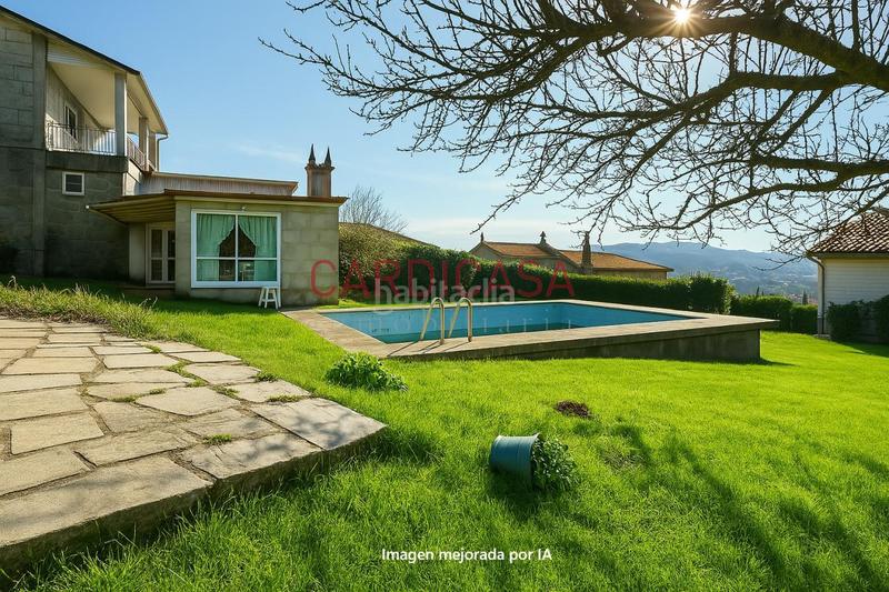 Foto 96be90a8-3281-4975-9265-9486810a7e7a. Casa amb calefacció aparcament piscina a Vilaboa