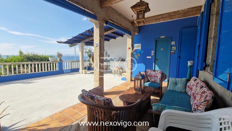 Foto b9e76110-4b9e-42e3-8e82-c4fa15eb996c. Casa chalet con vistas en loureiro, en Bueu