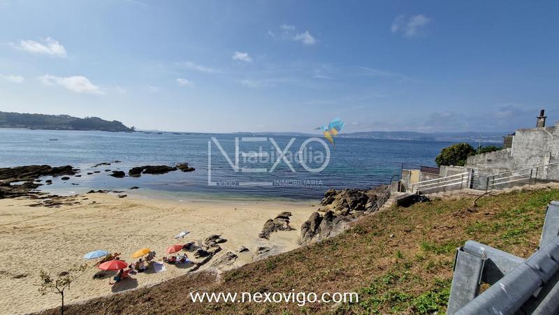 Foto c91fea0f-3a6a-47de-814c-8f00c5b66043. Casa chalet con vistas en loureiro, en Bueu