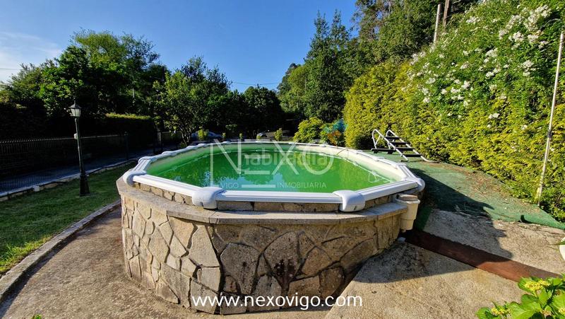 Foto b221a711-f99a-4e53-b7d3-e819bae5613b. Haus mit heizung parking pool in Aldán Cangas