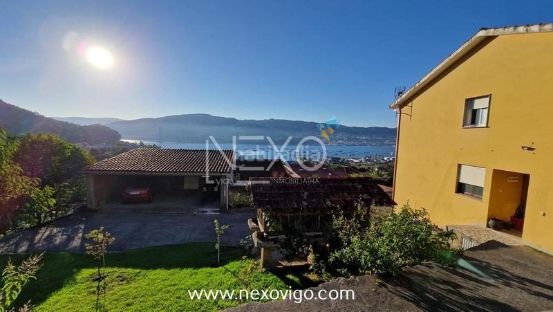 Foto 3ed89f79-0a35-4954-ba8b-95ba7c196612. Haus mit parking in Moaña