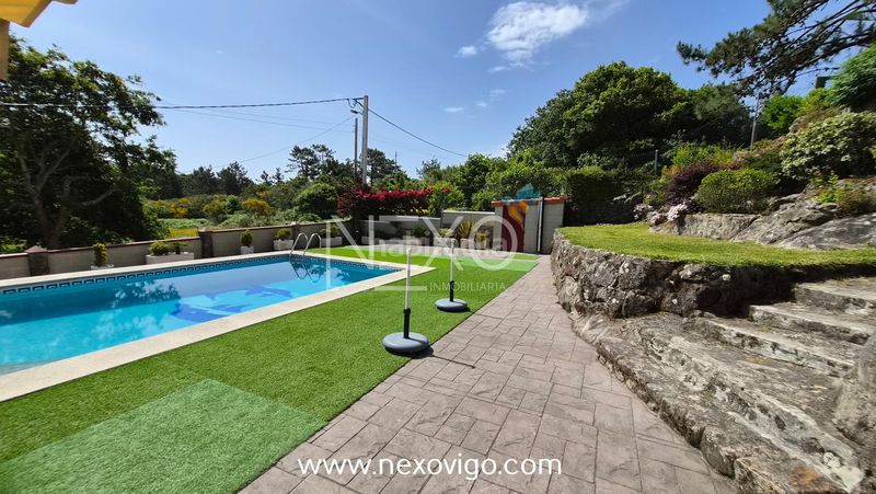 Foto 06b13a6d-9be9-4729-b378-a4c40c3474a9. Casa amb calefacció aparcament piscina a O Hío Cangas