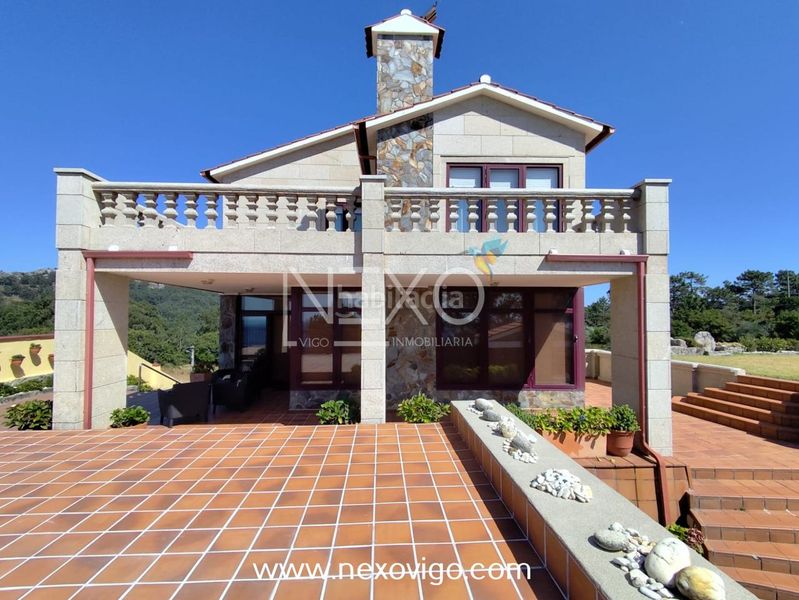 Foto 69d0f41e-b9fb-410d-b678-00ac2b23533c. Casa amb calefacció aparcament piscina a O Hío Cangas