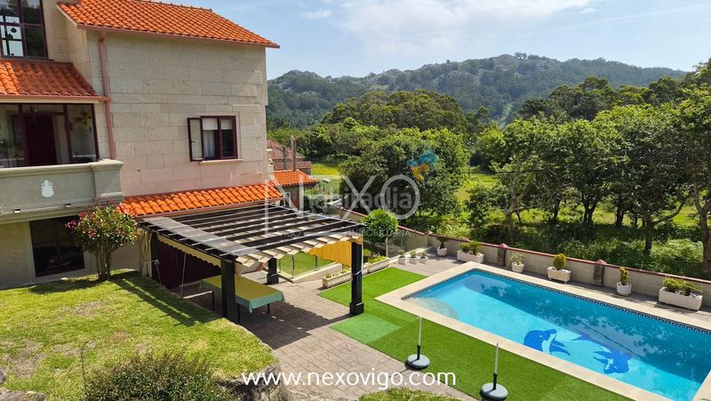 Foto 84adf760-05ac-497f-b669-db8301e394a8. Casa amb calefacció aparcament piscina a O Hío Cangas