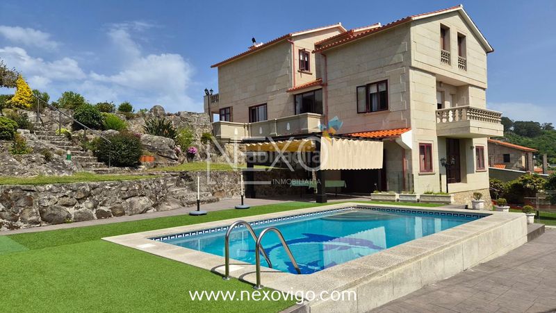 Foto b87e4c1a-5693-4f65-b7f3-aa62e426976b. Casa amb calefacció aparcament piscina a O Hío Cangas