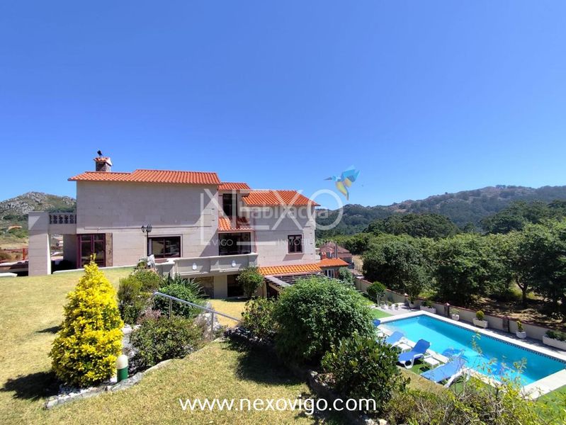 Foto cdb9b7f2-e046-4461-98f8-7b1d861ffbbf. Casa amb calefacció aparcament piscina a O Hío Cangas