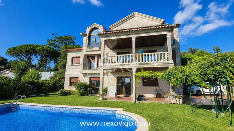 Foto 09c30bc1-cdd2-4567-9783-92d5944d3b38. Casa amb calefacció aparcament piscina a Darbo Cangas