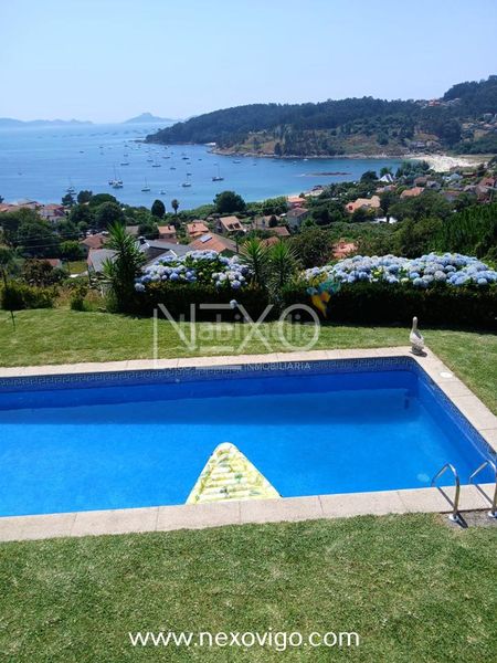 Foto 151b15e4-3a56-42eb-b780-b05410c40253. Casa amb calefacció aparcament piscina a Darbo Cangas