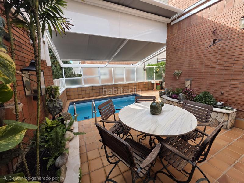 Foto 5d067190-e751-46df-bef0-01862238e747. Casa adossada amb xemeneia calefacció aparcament piscina a Barcelona