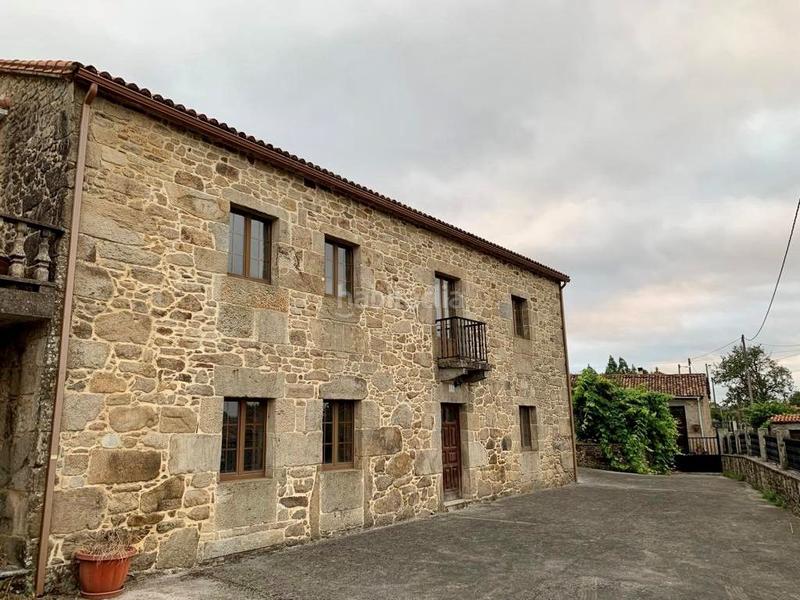 Foto 43f3b2e6-b686-4e0d-bd99-70d743cdfd61. Casa amb calefacció aparcament a Brión