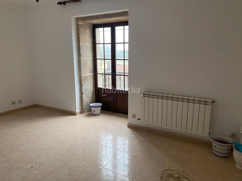 Foto 5e22279e-4532-4602-b282-80e7ffc3813b. Casa amb calefacció aparcament a Brión